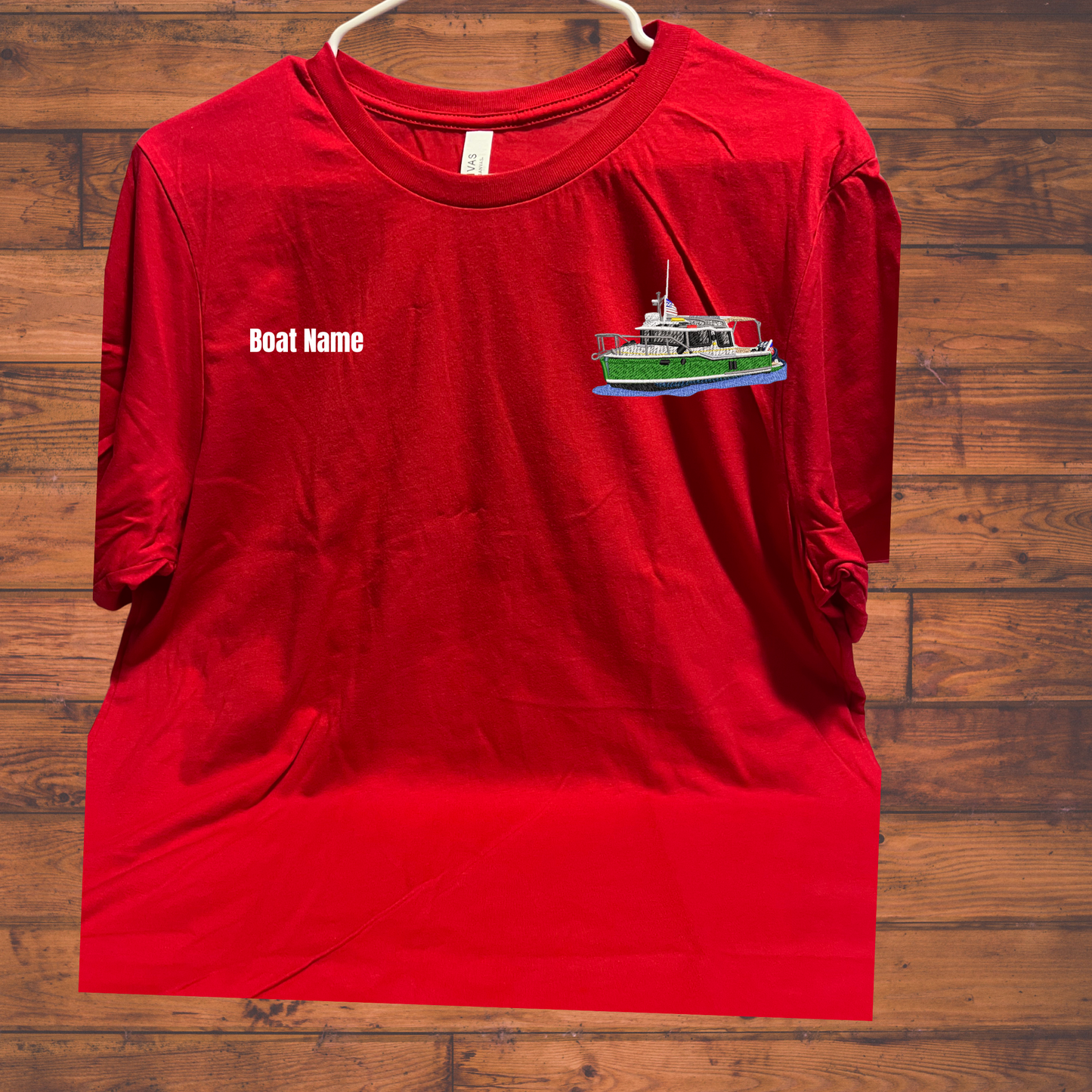 Short sleeve shirt with embroidered Ranger Tug boat on left chest and boat name on right