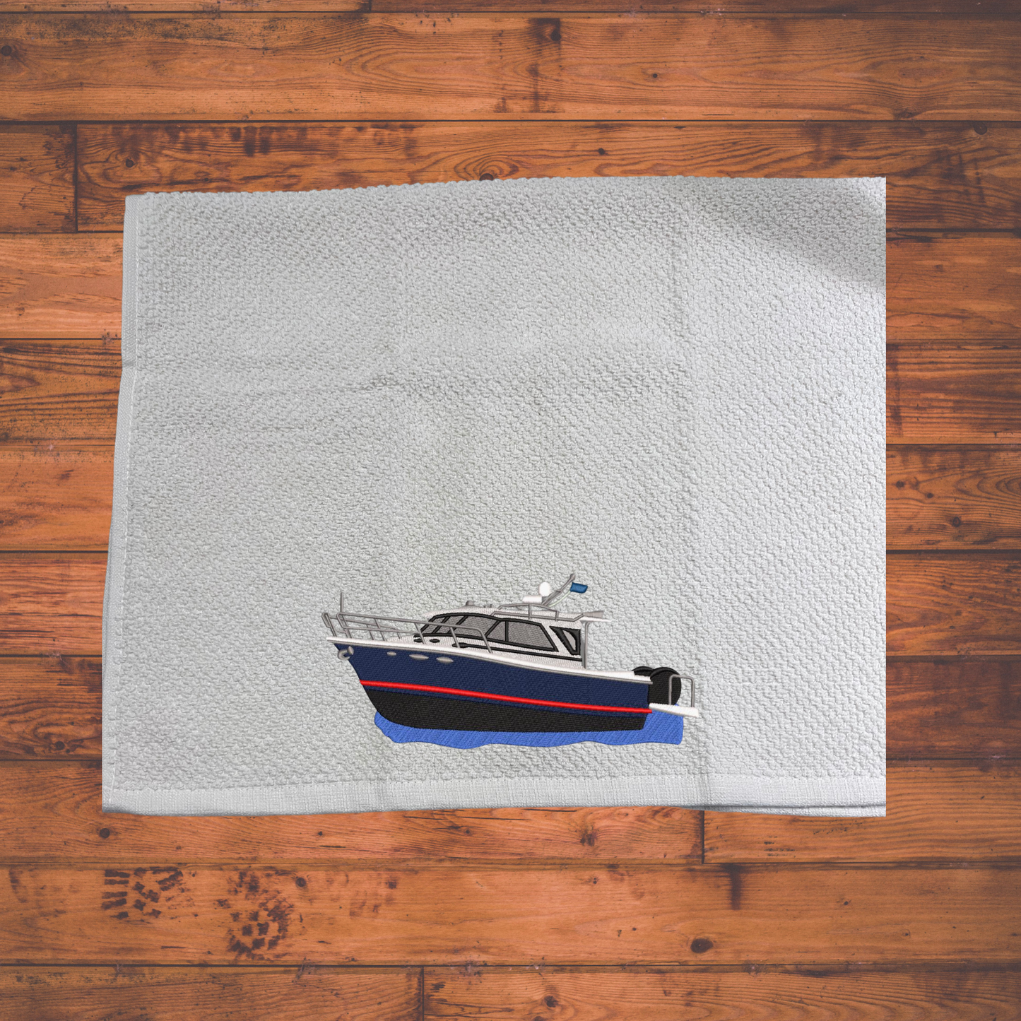 Galley Waffle towel With a Cutwater Boat Embroidered onto it