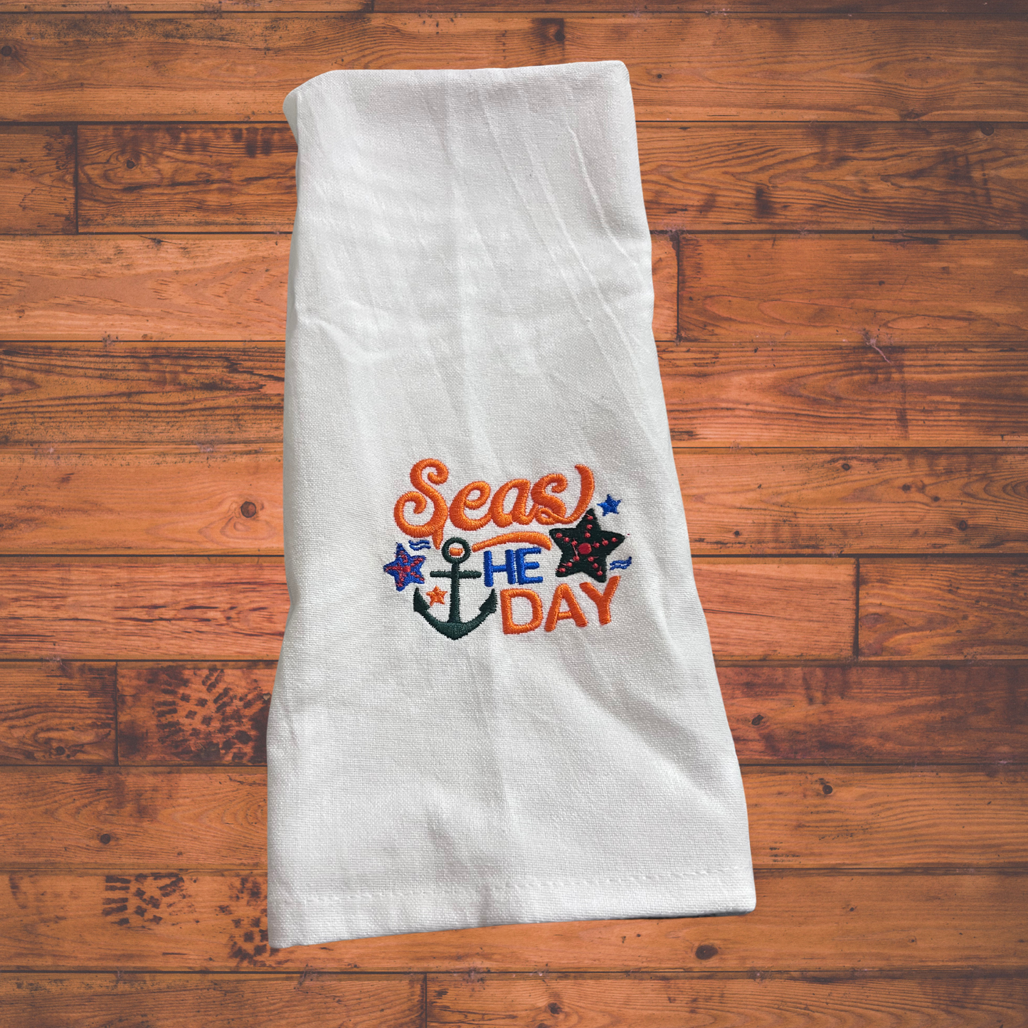 Embroidered dish towel "Seas the day" design